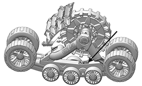 Drawing of a Camso track system with an arrow pointing to the serial number label on the bottom rail, between the road wheels