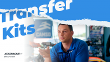 Feature image with a text overlay that says transfer kits, with an image of an atvtracks.net employee speaking to someone